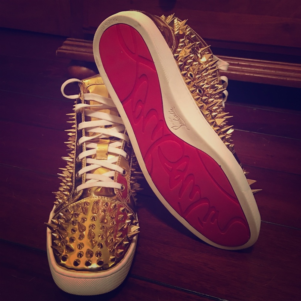 Gold Spiked Christian Louboutin sneakers
